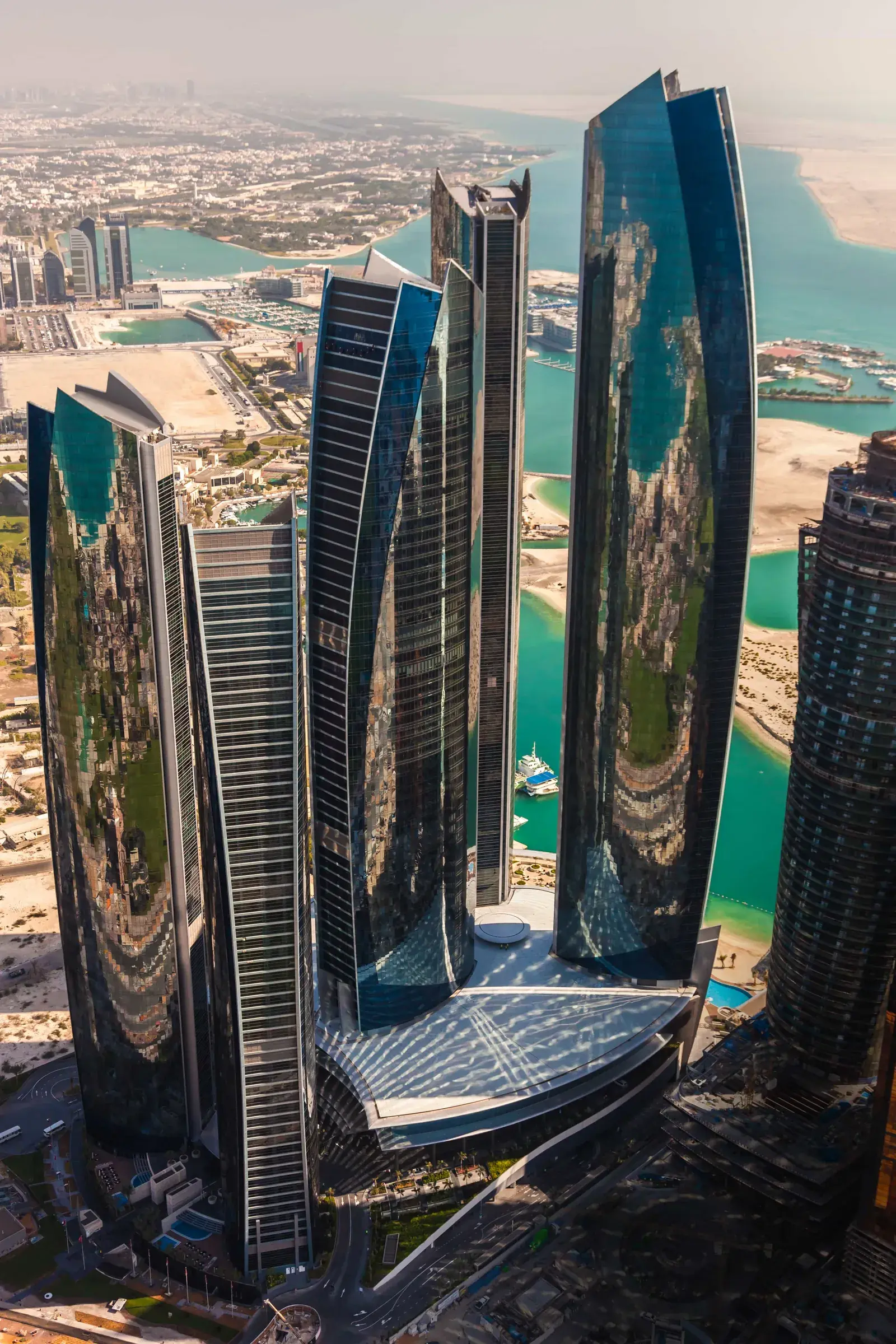 Etihad Towers on the Abu Dhabi Corniche, seen from above with the Arabian Gulf behind